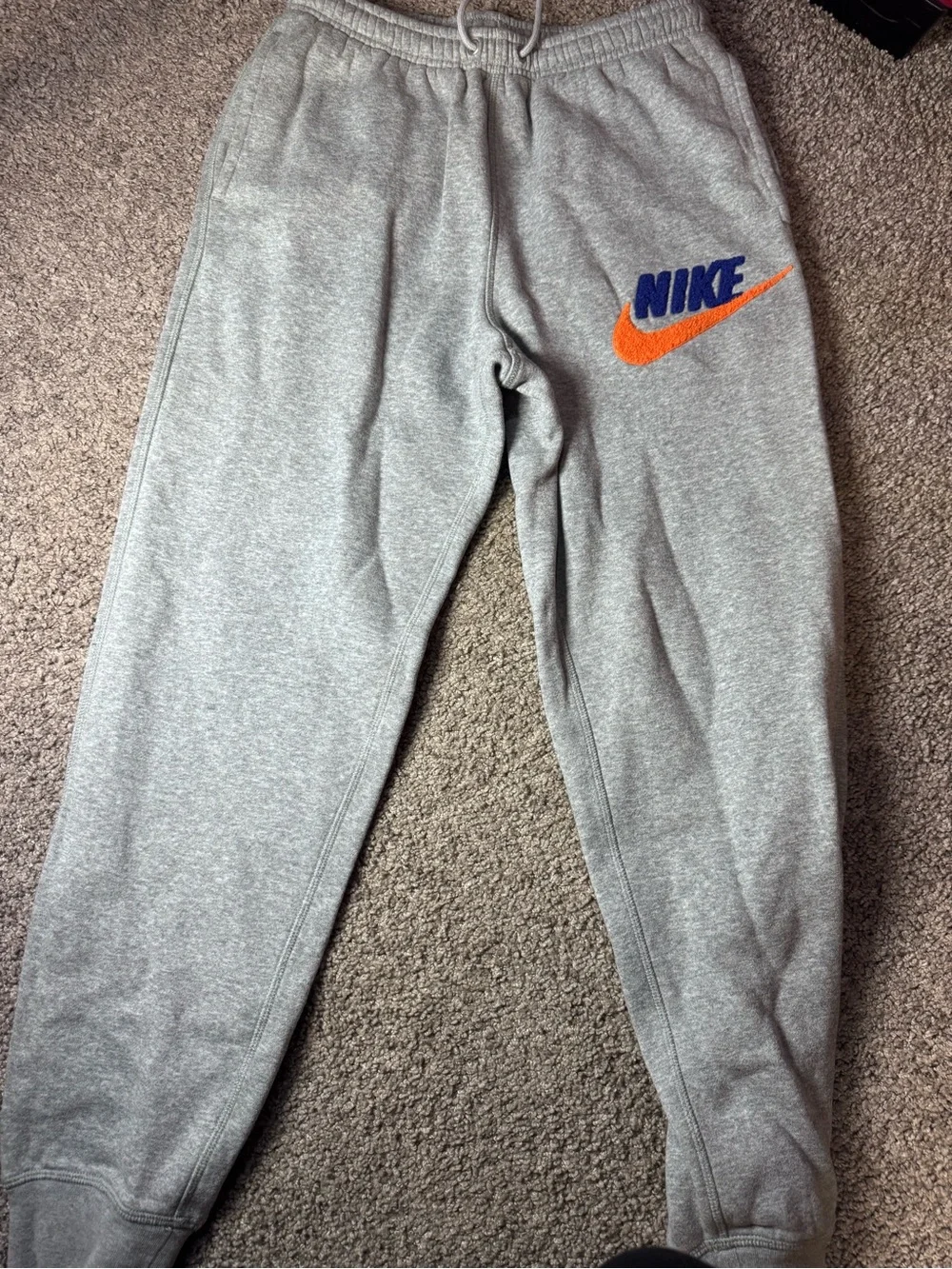 Nike Men’s Gray Sweatpants with Blue Logo and Orange Swoosh